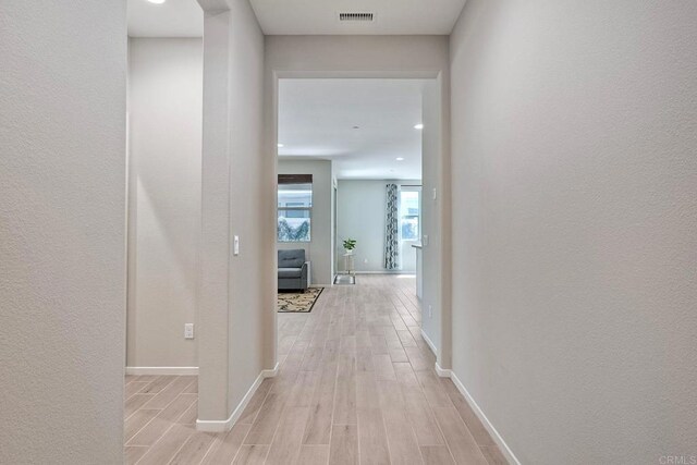 678 Gemstone Dr, San Marcos, CA 92078 - hall featuring light wood finished floors and baseboards