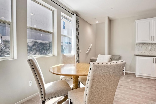 678 Gemstone Dr, San Marcos, CA 92078 - dining room with light wood-style flooring and baseboards
