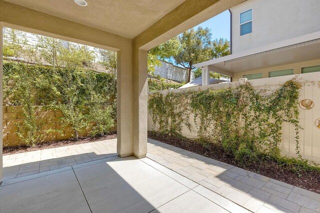 678 Gemstone Dr, San Marcos, CA 92078 - fenced backyard featuring a patio area