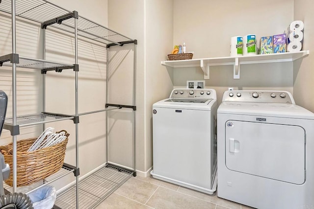 678 Gemstone Dr, San Marcos, CA 92078 - laundry area featuring independent washer and dryer, light tile patterned flooring, and baseboards