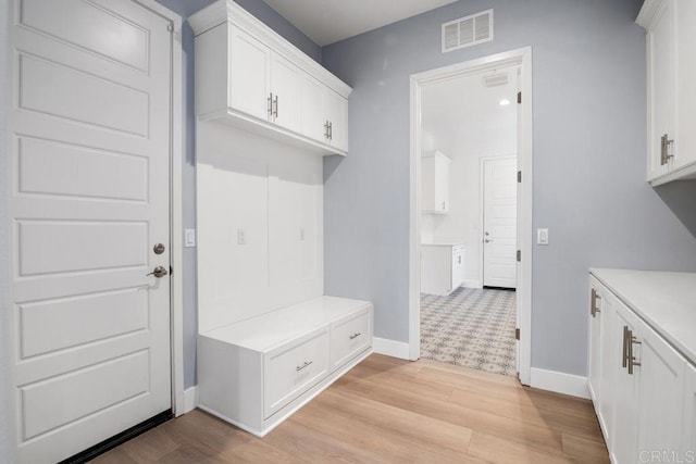 1733 Lemonadeberry Ln, Vista, CA 92084 - mudroom with baseboards and light wood-type flooring