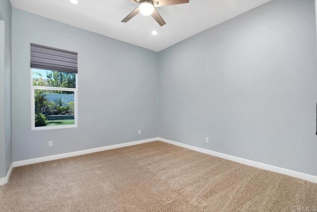 1733 Lemonadeberry Ln, Vista, CA 92084 - spare room featuring carpet flooring, ceiling fan, baseboards, and recessed lighting