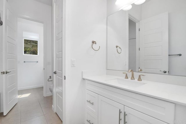 1733 Lemonadeberry Ln, Vista, CA 92084 - bathroom with vanity, tile patterned flooring, toilet, and baseboards
