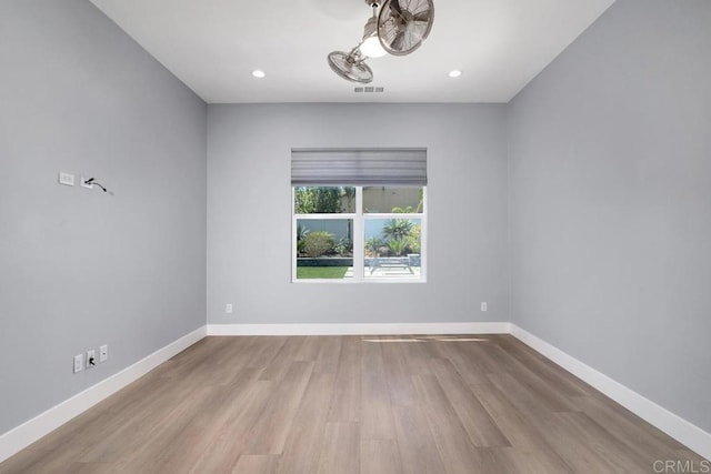 1733 Lemonadeberry Ln, Vista, CA 92084 - unfurnished room with wood finished floors, baseboards, and recessed lighting