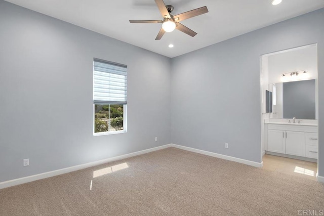1733 Lemonadeberry Ln, Vista, CA 92084 - unfurnished bedroom featuring light colored carpet, recessed lighting, ensuite bathroom, and ceiling fan