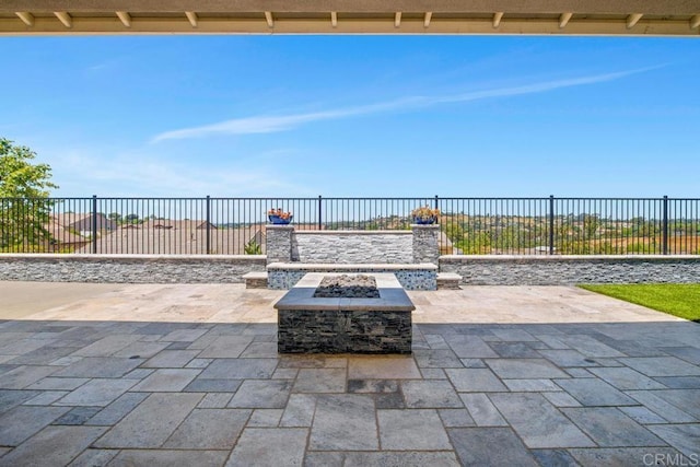 1733 Lemonadeberry Ln, Vista, CA 92084 - fenced backyard featuring a patio area and an outdoor fire pit