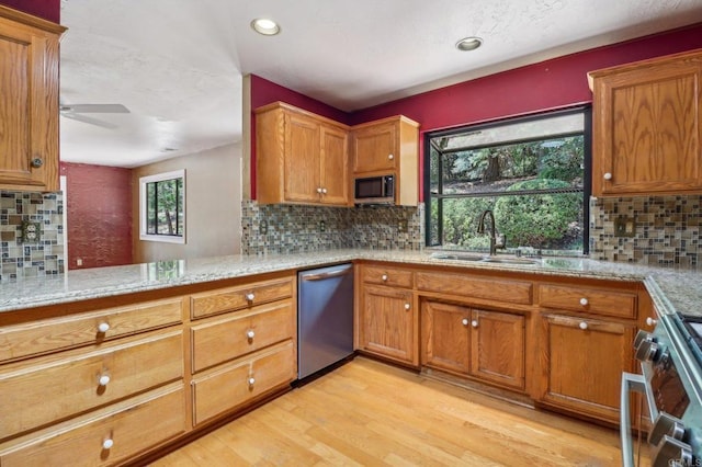 1575 Larson Ln, Fallbrook, CA 92028 - kitchen with dishwasher, a sink, range, decorative backsplash, and ceiling fan