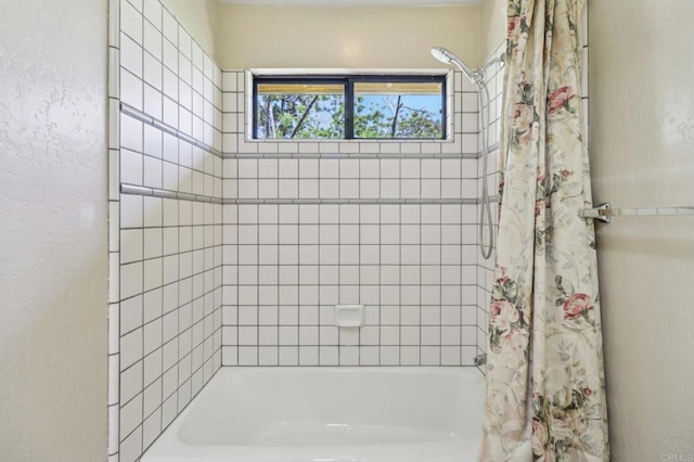 1575 Larson Ln, Fallbrook, CA 92028 - bathroom featuring shower / tub combo with curtain and a textured wall