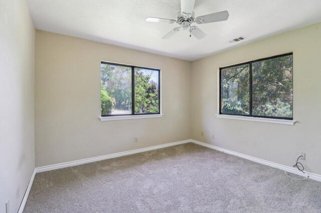 1575 Larson Ln, Fallbrook, CA 92028 - carpeted spare room with baseboards and a ceiling fan