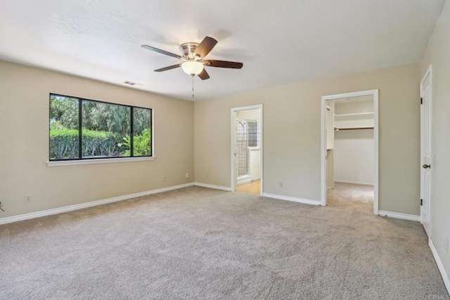 1575 Larson Ln, Fallbrook, CA 92028 - unfurnished bedroom featuring a spacious closet, carpet flooring, and baseboards