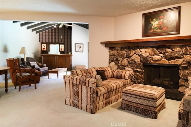 10035 Gierson Ave, Chatsworth, CA 91311 - living area with a stone fireplace, a ceiling fan, light colored carpet, and a textured ceiling