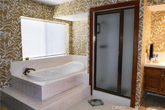 10035 Gierson Ave, Chatsworth, CA 91311 - full bath with wallpapered walls, a bath, vanity, and a stall shower