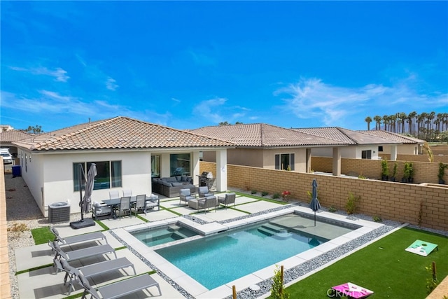 56217 Platinum Way, La Quinta, CA 92253 - back of house with an outdoor living space, stucco siding, a fenced backyard, and a patio