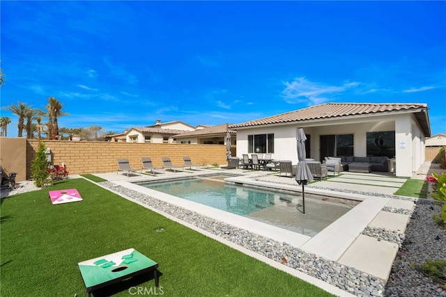 56217 Platinum Way, La Quinta, CA 92253 - back of property with an outdoor living space, a patio, stucco siding, and a tile roof