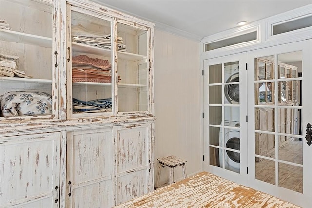 230 Esplanade, San Clemente, CA 92672 - entryway with stacked washer / drying machine, french doors, and ornamental molding