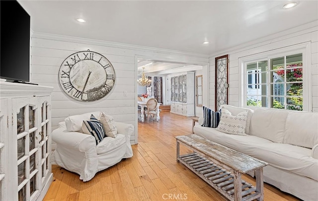 230 Esplanade, San Clemente, CA 92672 - living room with a chandelier, wood finished floors, ornamental molding, recessed lighting, and wooden walls