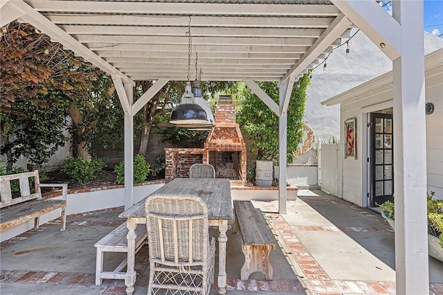 230 Esplanade, San Clemente, CA 92672 - view of patio with an outdoor brick fireplace and outdoor dining space