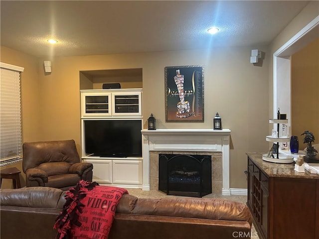 27951 Via De Costa, San Juan Capistrano, CA 92675 - living room with a textured ceiling, a fireplace, baseboards, and recessed lighting