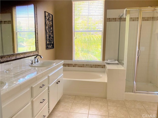27951 Via De Costa, San Juan Capistrano, CA 92675 - bathroom with a shower stall, double vanity, tile patterned flooring, and a garden tub