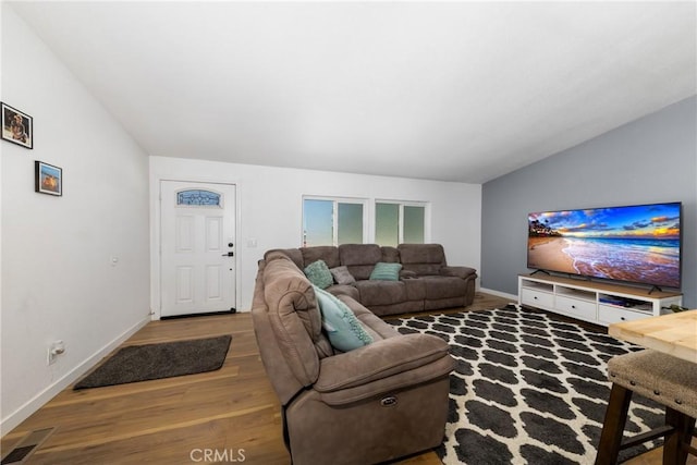 38448 95th St E, Palmdale, CA 93591 - living area with wood finished floors, baseboards, and vaulted ceiling