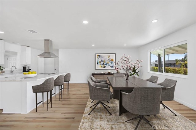 28870 Crosby Dr, Menifee, CA 92586 - dining space featuring recessed lighting, light wood-type flooring, and baseboards