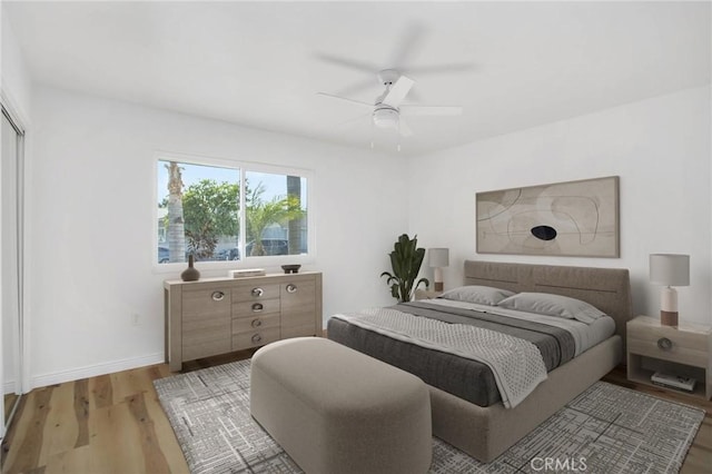 28870 Crosby Dr, Menifee, CA 92586 - bedroom featuring light wood-style floors, ceiling fan, and baseboards