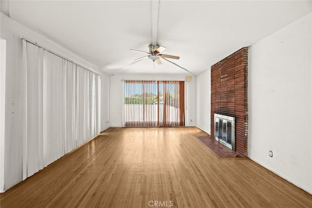 2517 S 2nd Ave, Arcadia, CA 91006 - unfurnished living room with a ceiling fan, wood finished floors, a fireplace, and lofted ceiling