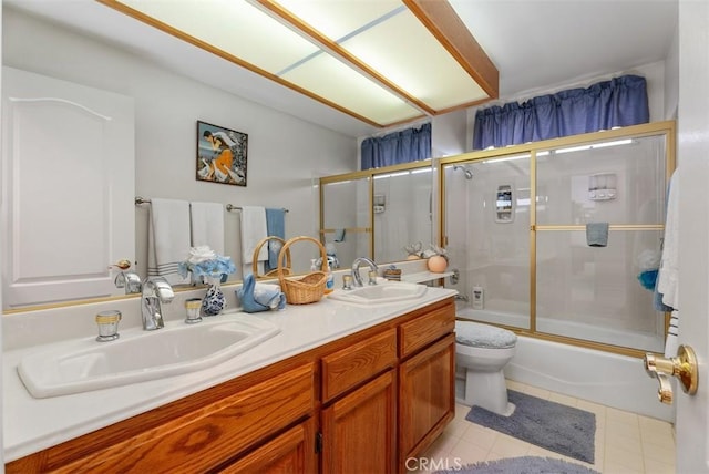 29206 Alfieri St, Laguna Niguel, CA 92677 - bathroom with toilet, double vanity, combined bath / shower with glass door, and tile patterned flooring