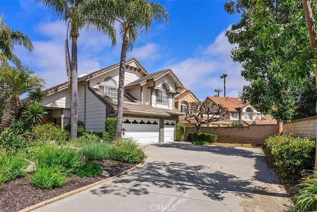 29206 Alfieri St, Laguna Niguel, CA 92677 - view of front of house featuring concrete driveway, an attached garage, and a tiled roof