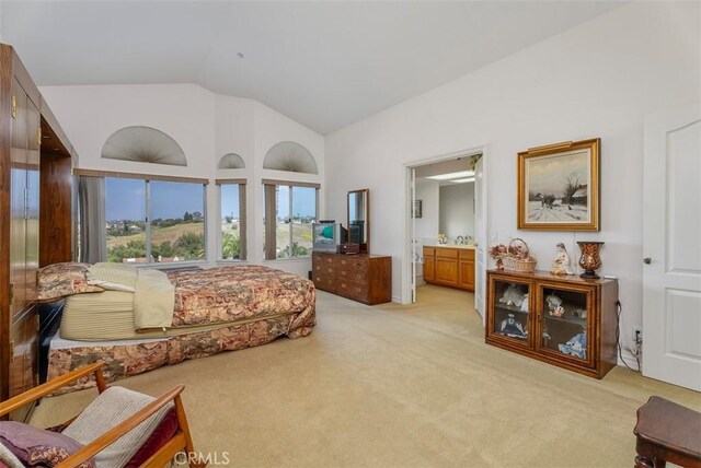 29206 Alfieri St, Laguna Niguel, CA 92677 - bedroom with light colored carpet, vaulted ceiling, and ensuite bathroom