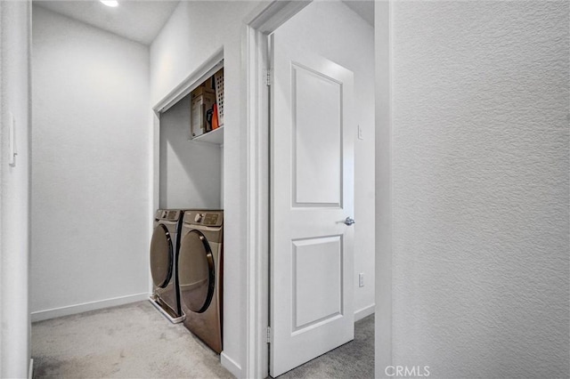 3540 W Savanna St, Anaheim, CA 92804 - laundry area with carpet, baseboards, washing machine and clothes dryer, and a textured wall