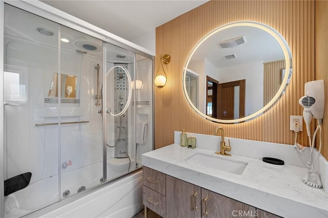 5742 Thelma Ave, La Palma, CA 90623 - bathroom featuring vanity and bath / shower combo with glass door