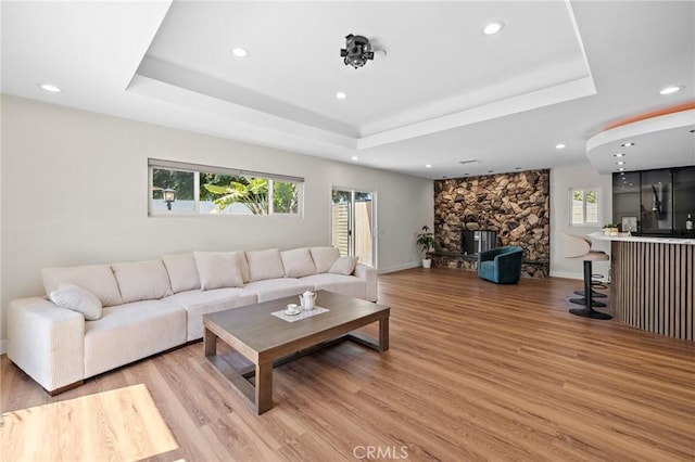 5742 Thelma Ave, La Palma, CA 90623 - living area with recessed lighting, a raised ceiling, and light wood-style flooring