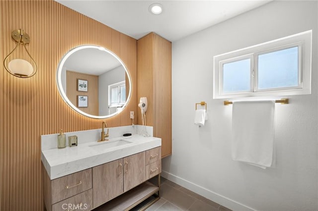5742 Thelma Ave, La Palma, CA 90623 - bathroom with vanity, tile patterned flooring, baseboards, and plenty of natural light