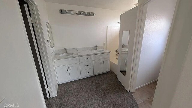 3929 Albillo, Perris, CA 92571 - full bathroom featuring tub / shower combination, double vanity, and tile patterned floors