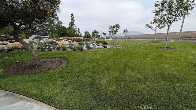 3929 Albillo, Perris, CA 92571 - view of green lawn with a mountain view