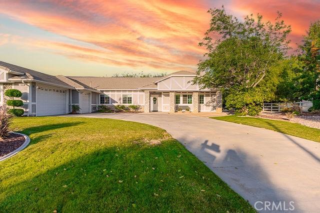 36884 Hidden Trail Ct, Winchester, CA 92596 - view of front of home with a lawn, concrete driveway, and an attached garage