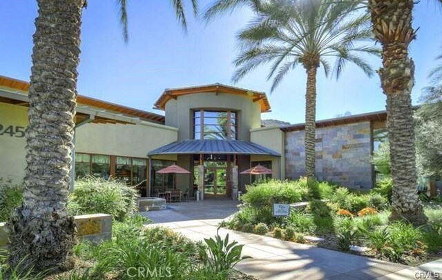 24271 Whitetail Dr, Corona, CA 92883 - surrounding community with a patio area