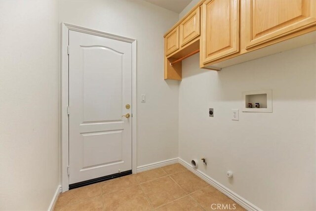 24271 Whitetail Dr, Corona, CA 92883 - laundry area featuring washer hookup, electric dryer hookup, hookup for a gas dryer, baseboards, and cabinet space