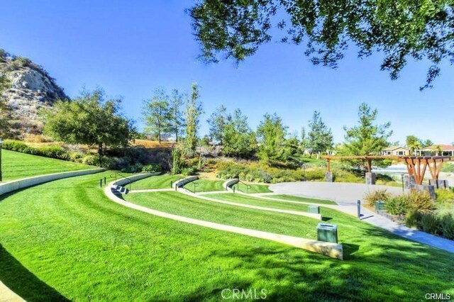 24271 Whitetail Dr, Corona, CA 92883 - view of home's community featuring a yard