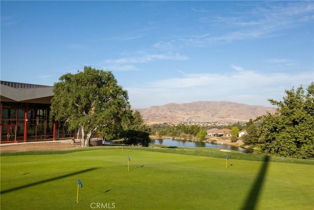 24271 Whitetail Dr, Corona, CA 92883 - view of community with a putting green, a water and mountain view, and view of golf course