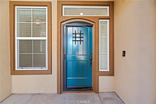 24271 Whitetail Dr, Corona, CA 92883 - view of exterior entry featuring stucco siding