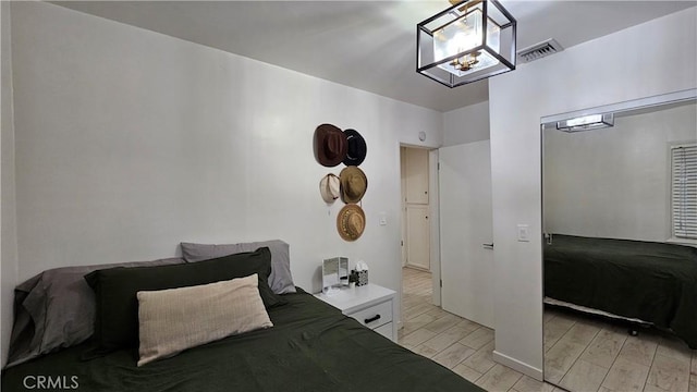 402 Hartzell Ave, Redlands, CA 92374 - bedroom with light wood-style flooring