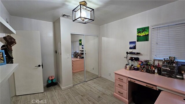 402 Hartzell Ave, Redlands, CA 92374 - office area with light wood finished floors and baseboards