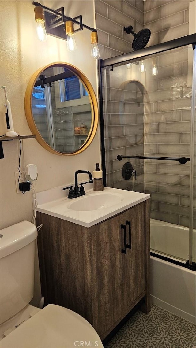 402 Hartzell Ave, Redlands, CA 92374 - full bath featuring toilet, vanity, and enclosed tub / shower combo