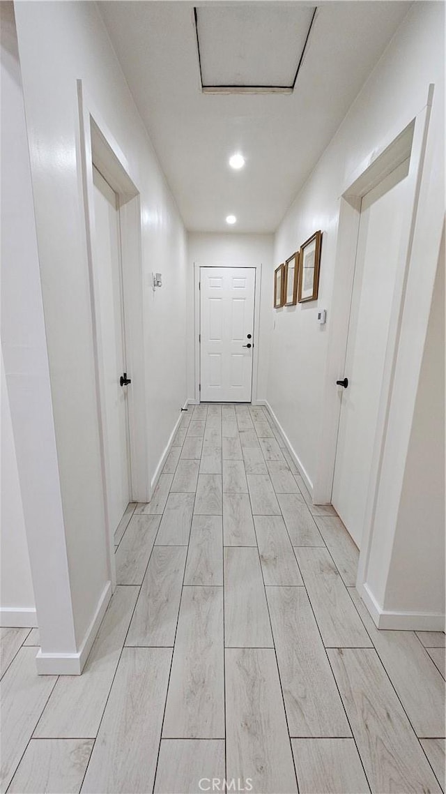 402 Hartzell Ave, Redlands, CA 92374 - hallway with baseboards, recessed lighting, and attic access