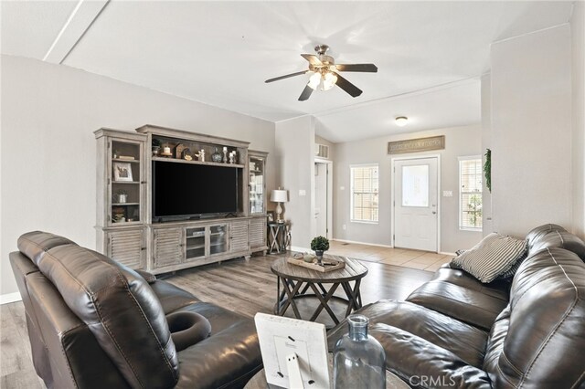 3595 Buchanan St, Riverside, CA 92503 - living area with a ceiling fan, baseboards, and wood finished floors