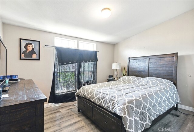 3595 Buchanan St, Riverside, CA 92503 - bedroom with light wood-type flooring and baseboards