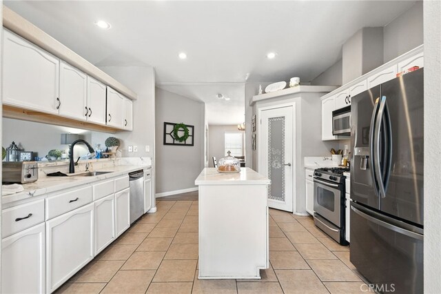 3595 Buchanan St, Riverside, CA 92503 - kitchen featuring stainless steel appliances, a sink, a center island, white cabinetry, and recessed lighting