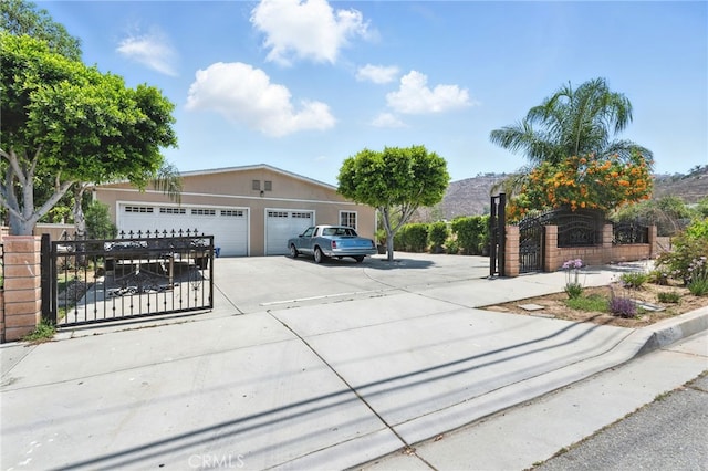 3595 Buchanan St, Riverside, CA 92503 - view of front of house with stucco siding and a gate